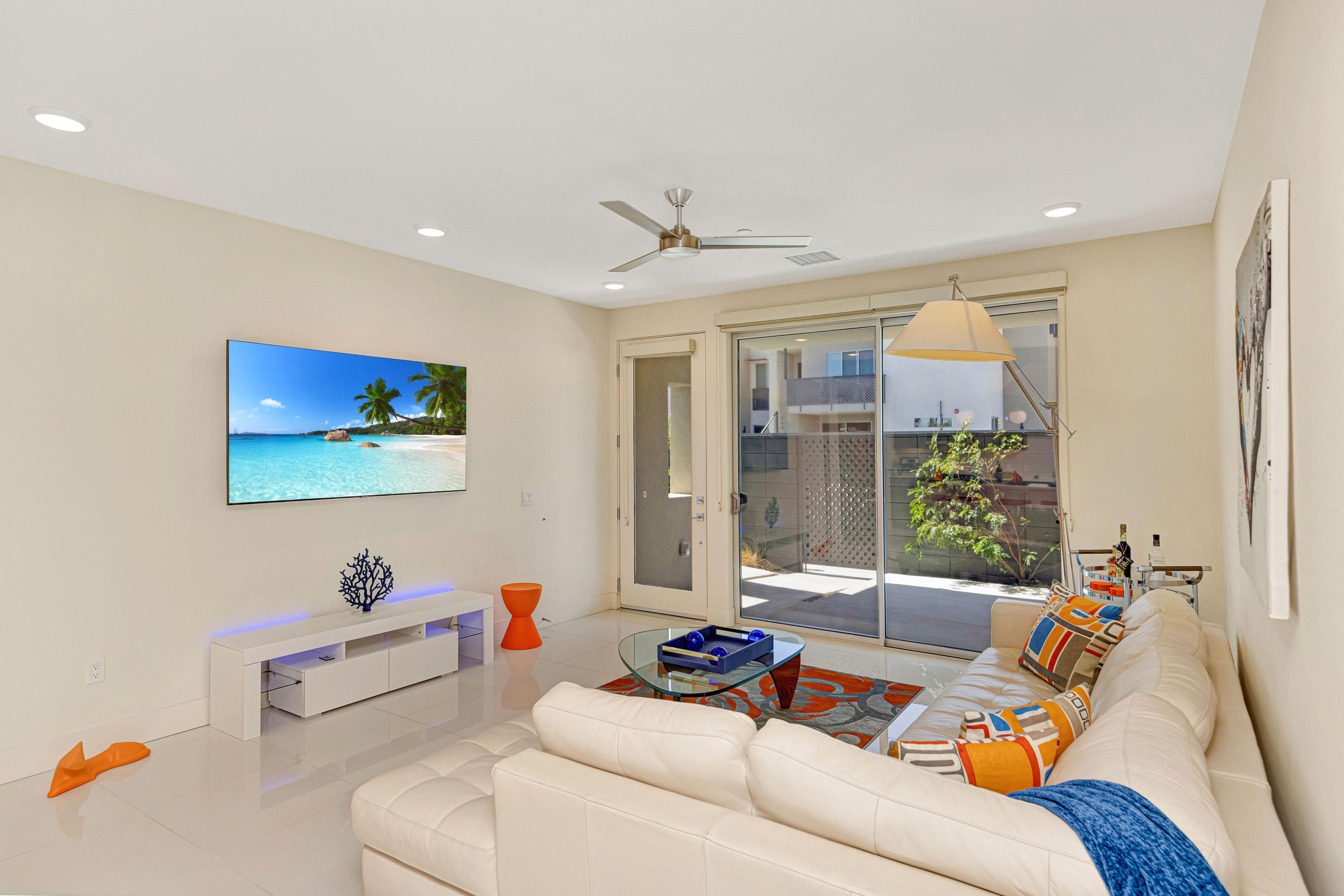 161 The River Palm Springs, CA 92262 - Photo 8 of 46 a living room with furniture and a large window