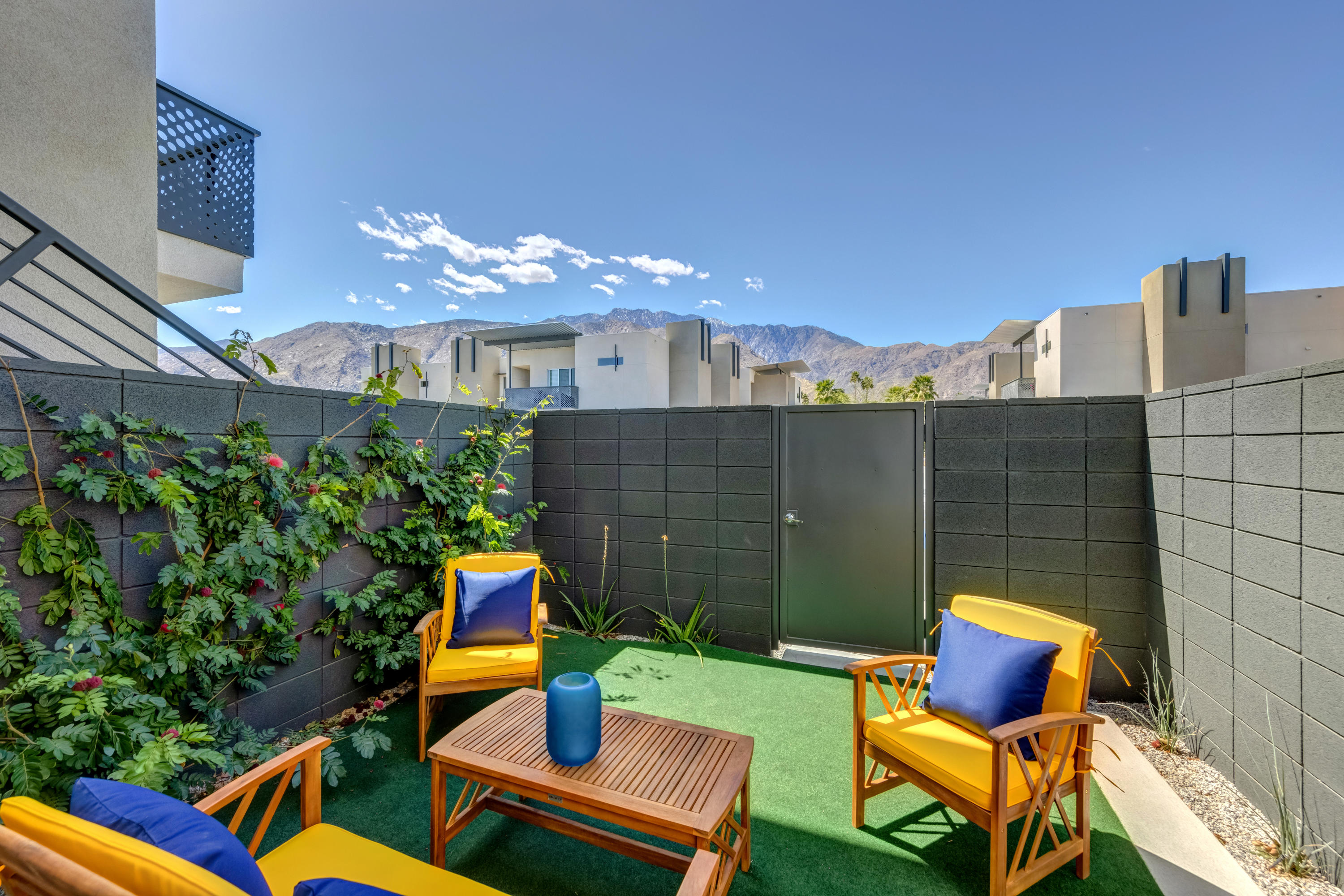 161 The River Palm Springs, CA 92262 - Photo 9 of 46 a backyard of a house with outdoor seating