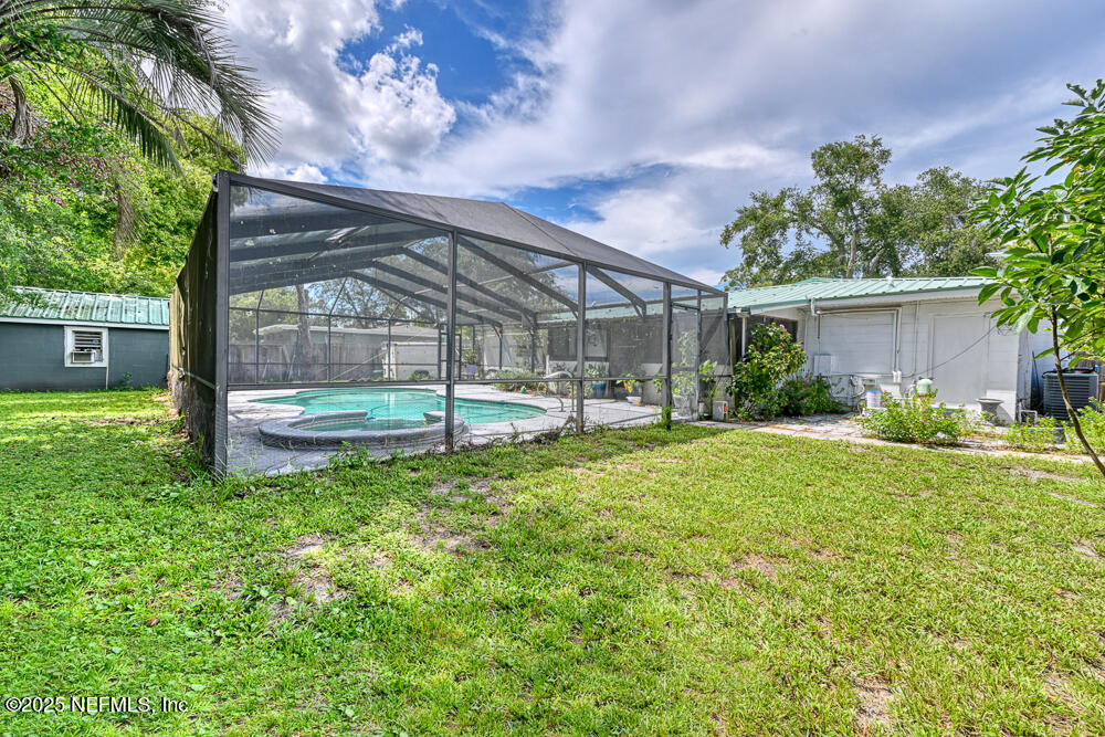 6408 Diane Road Jacksonville, FL 32277 - Photo 25 of 30 a garden view with a seating space