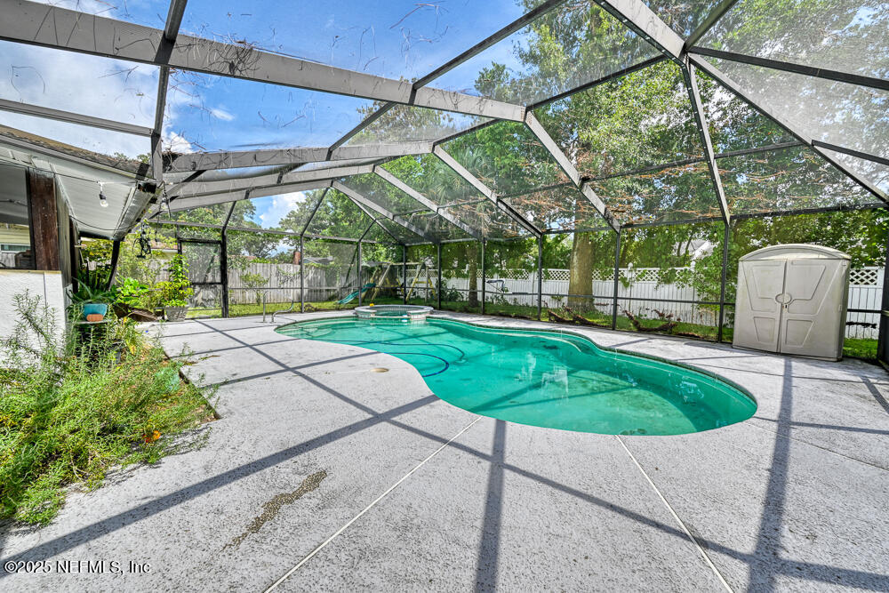 6408 Diane Road Jacksonville, FL 32277 - Photo 30 of 30 a garden view with a seating space