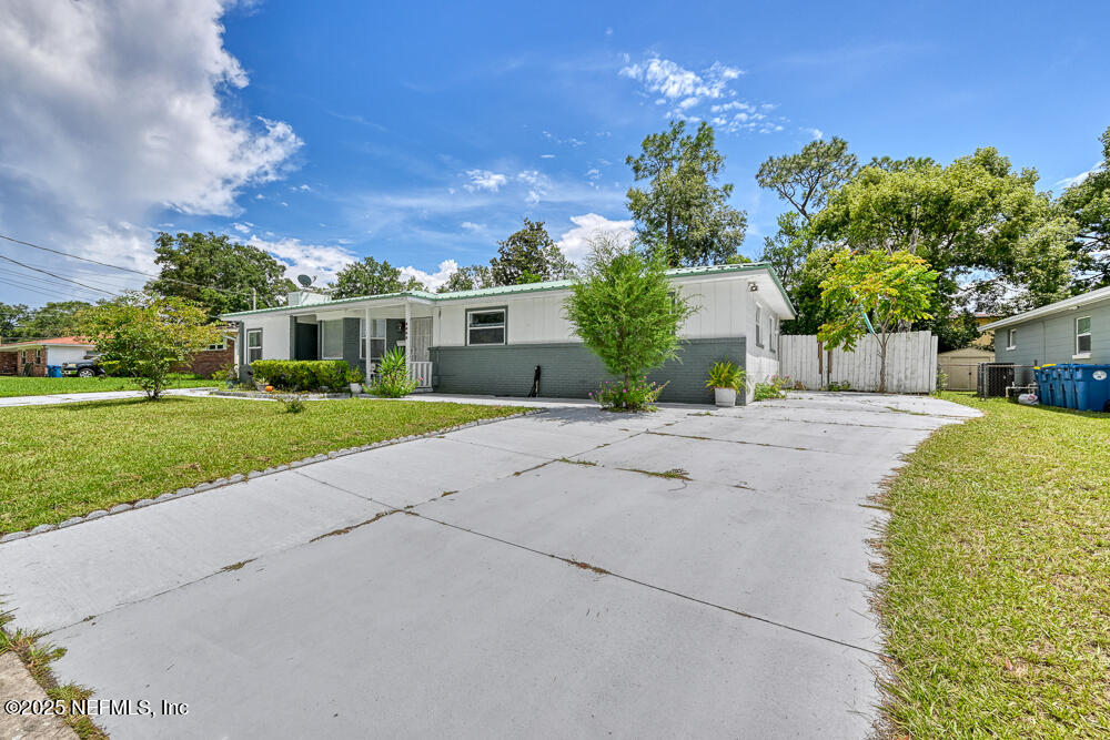 6408 Diane Road Jacksonville, FL 32277 - Photo 3 of 30 a view of house with yard and green space