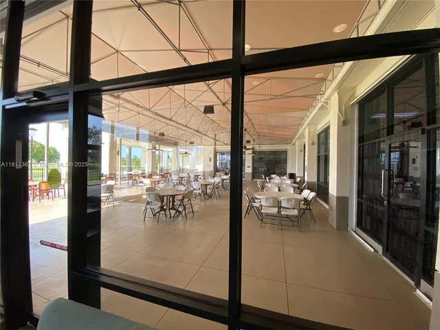 a living room view with sitting space