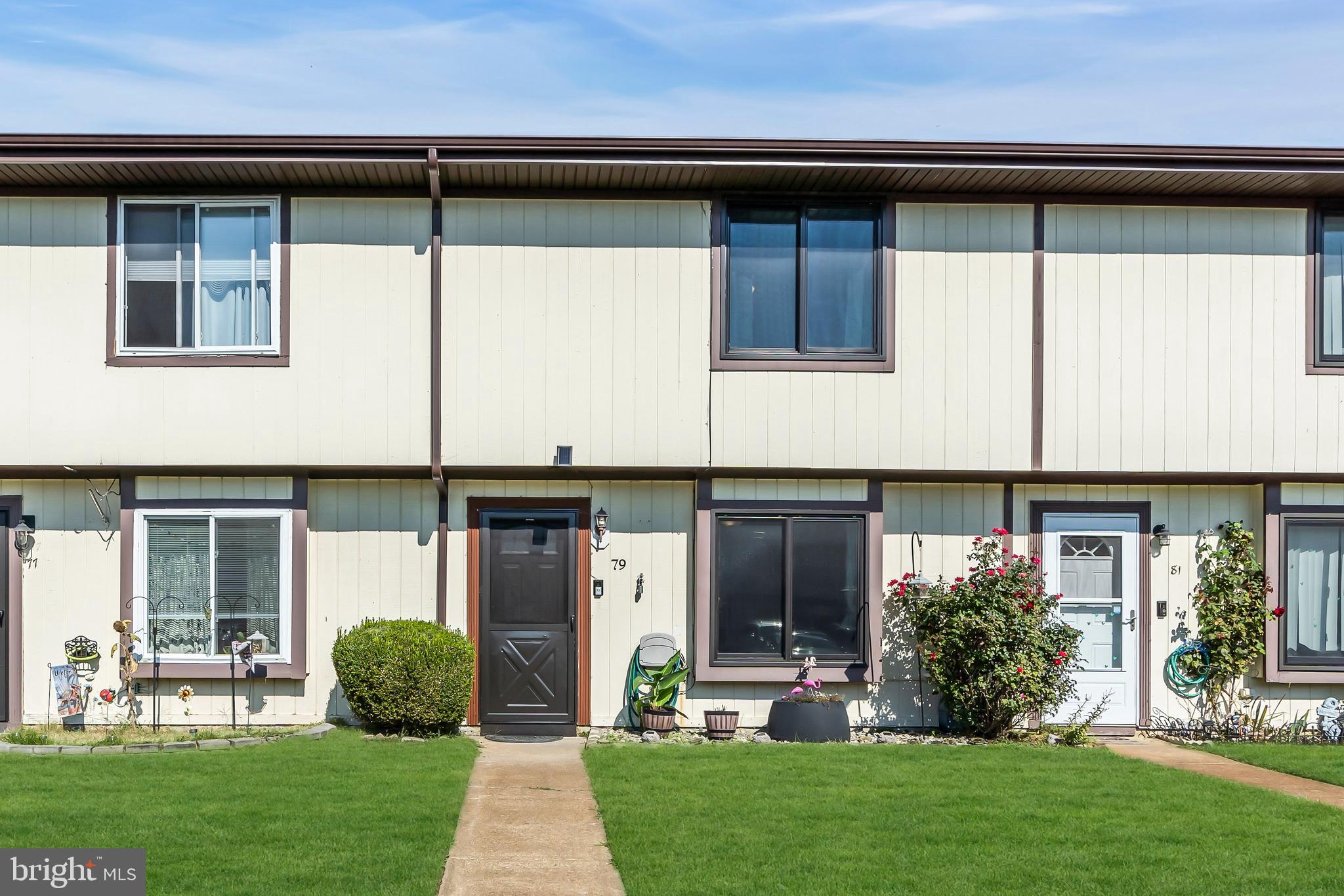 a house view with a garden space