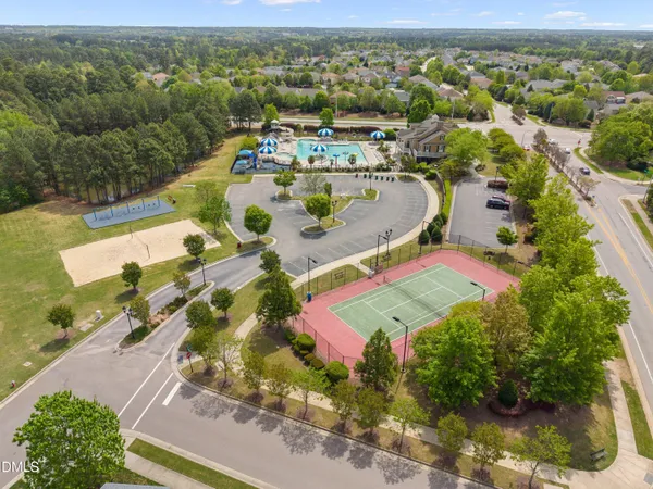 an aerial view of a house with a swimming pool
