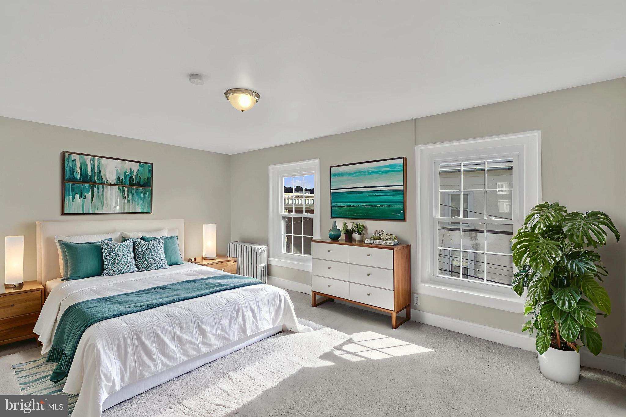 4413 Baker Street Philadelphia, PA 19127 - Photo 12 of 30 a bedroom with a bed and a window