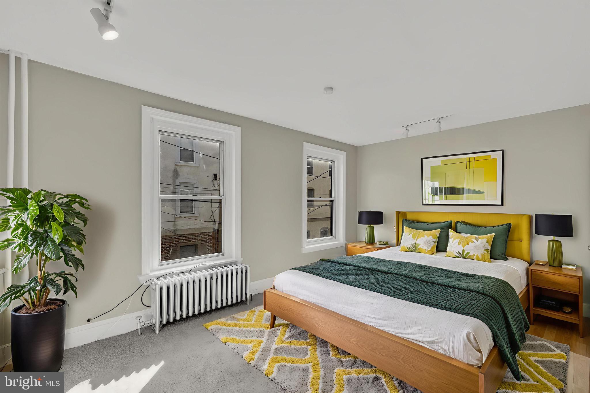 4413 Baker Street Philadelphia, PA 19127 - Photo 16 of 30 a bedroom with a bed and a window