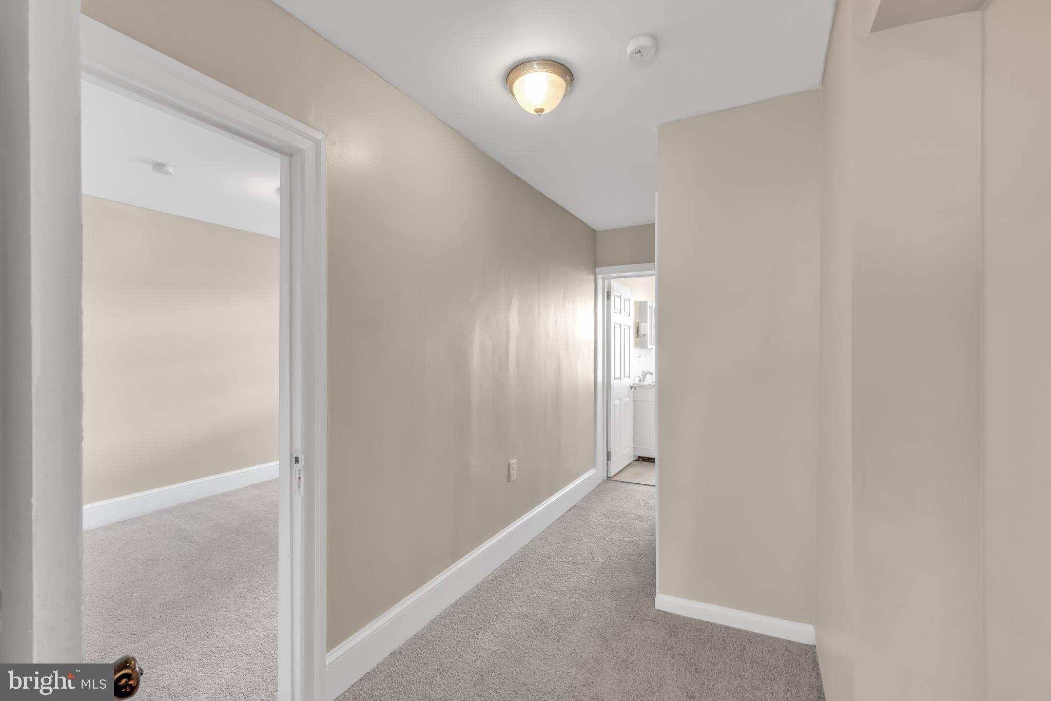 4413 Baker Street Philadelphia, PA 19127 - Photo 18 of 30 a view of a hallway with wooden floor