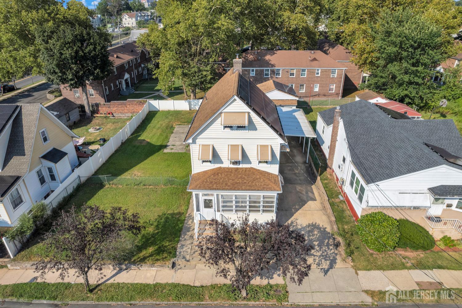 25 Rutgers Street New Brunswick, NJ 08901 - Photo 3 of 3 an aerial view of a house with a garden