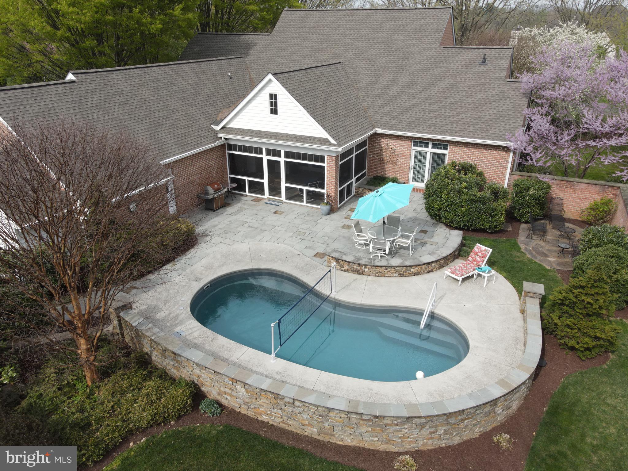 18 Deerfield Road Lancaster, PA 17603 - Photo 25 of 31 Pool and screened in porch with plumbed grill