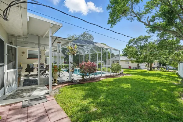 a view of a chairs and tables in the patio