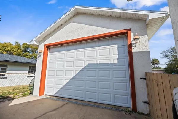 a front view of a house with a garage