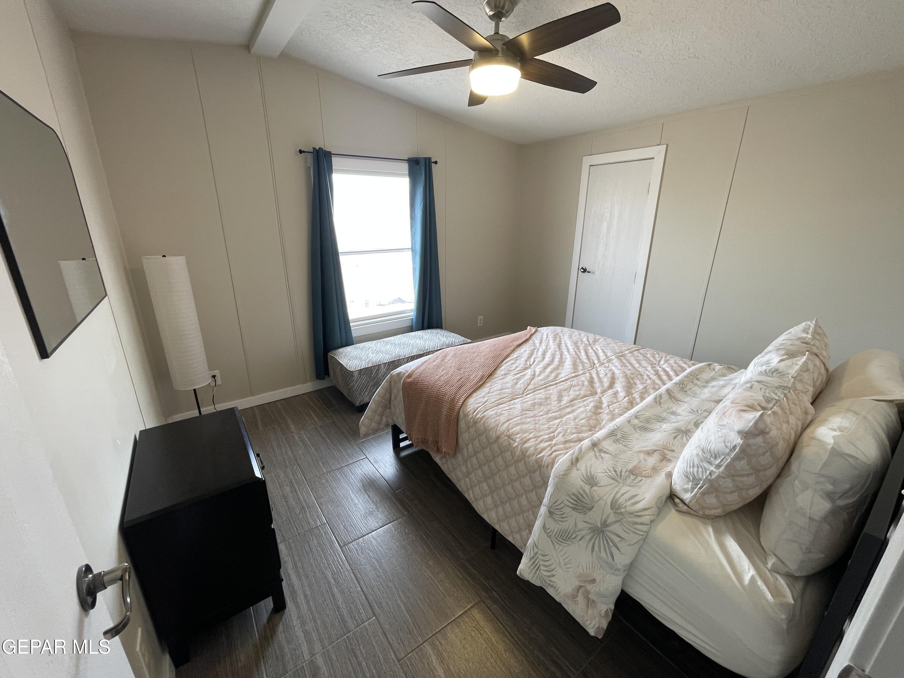 2901 Cook Street Truth Or Consequences, NM 87901 - Photo 18 of 28 a bedroom with a bed and window