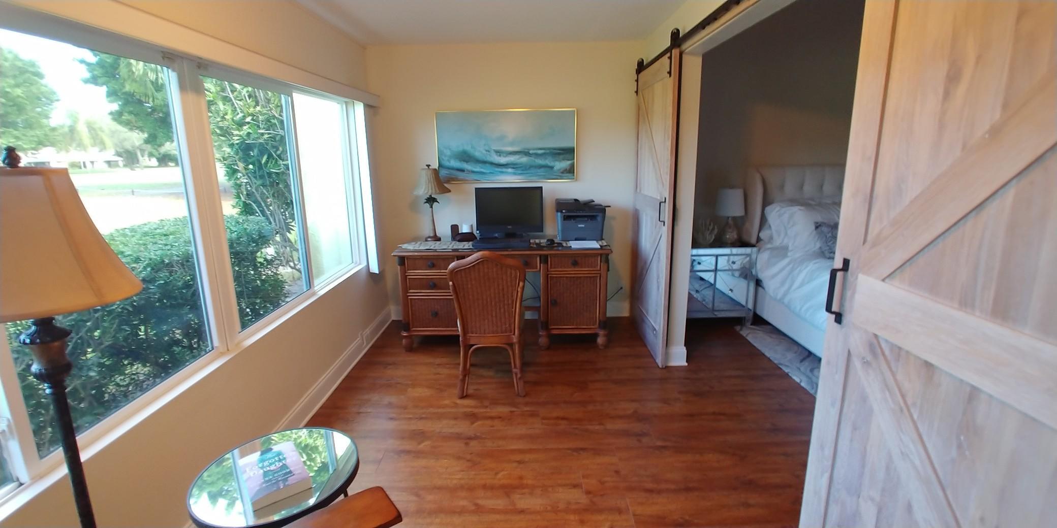 17042 Traverse Circle Jupiter, FL 33477 - Photo 14 of 30 a living room with furniture and a wooden floor