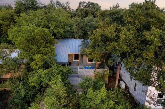 an aerial view of a city with lots of residential buildings