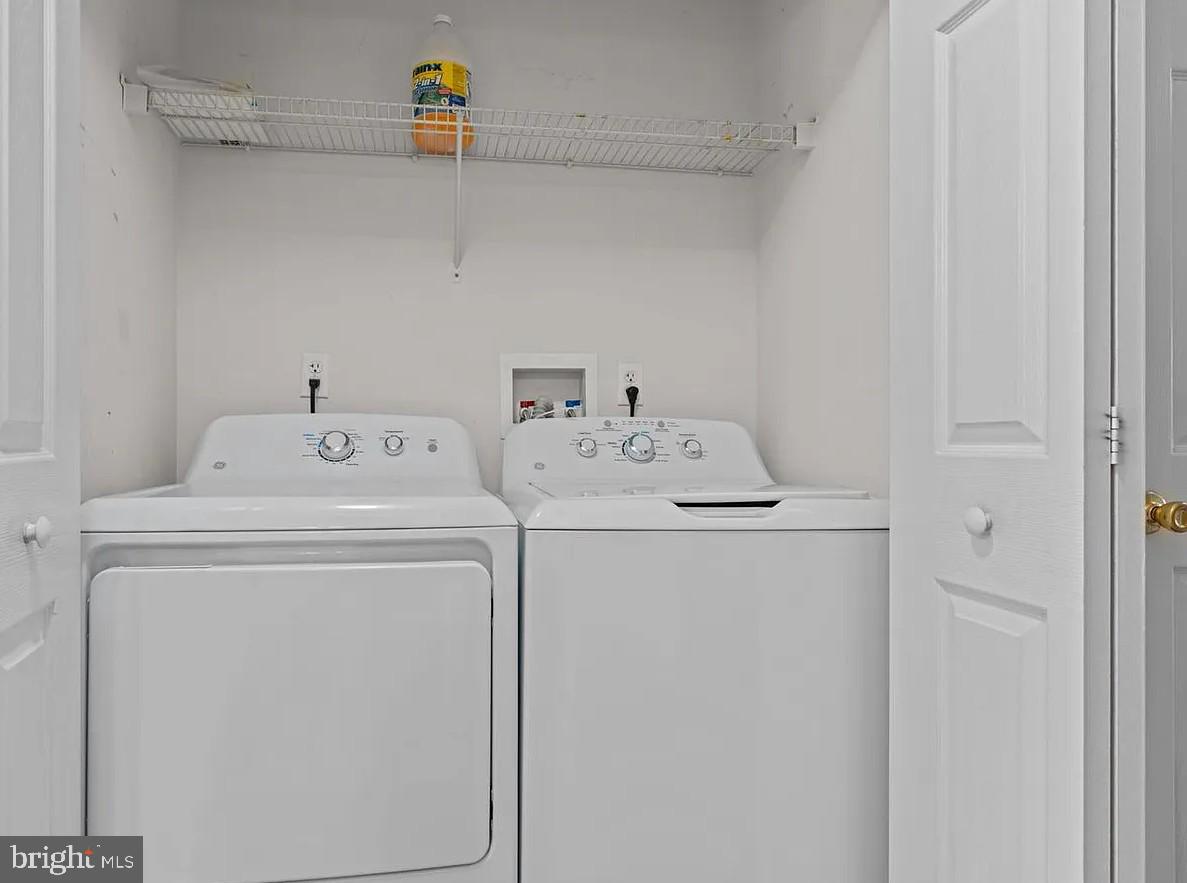 9228 Blue Grass Road, Unit 30 Philadelphia, PA 19114 - Photo 11 of 11 Efficient laundry space for modern living.
