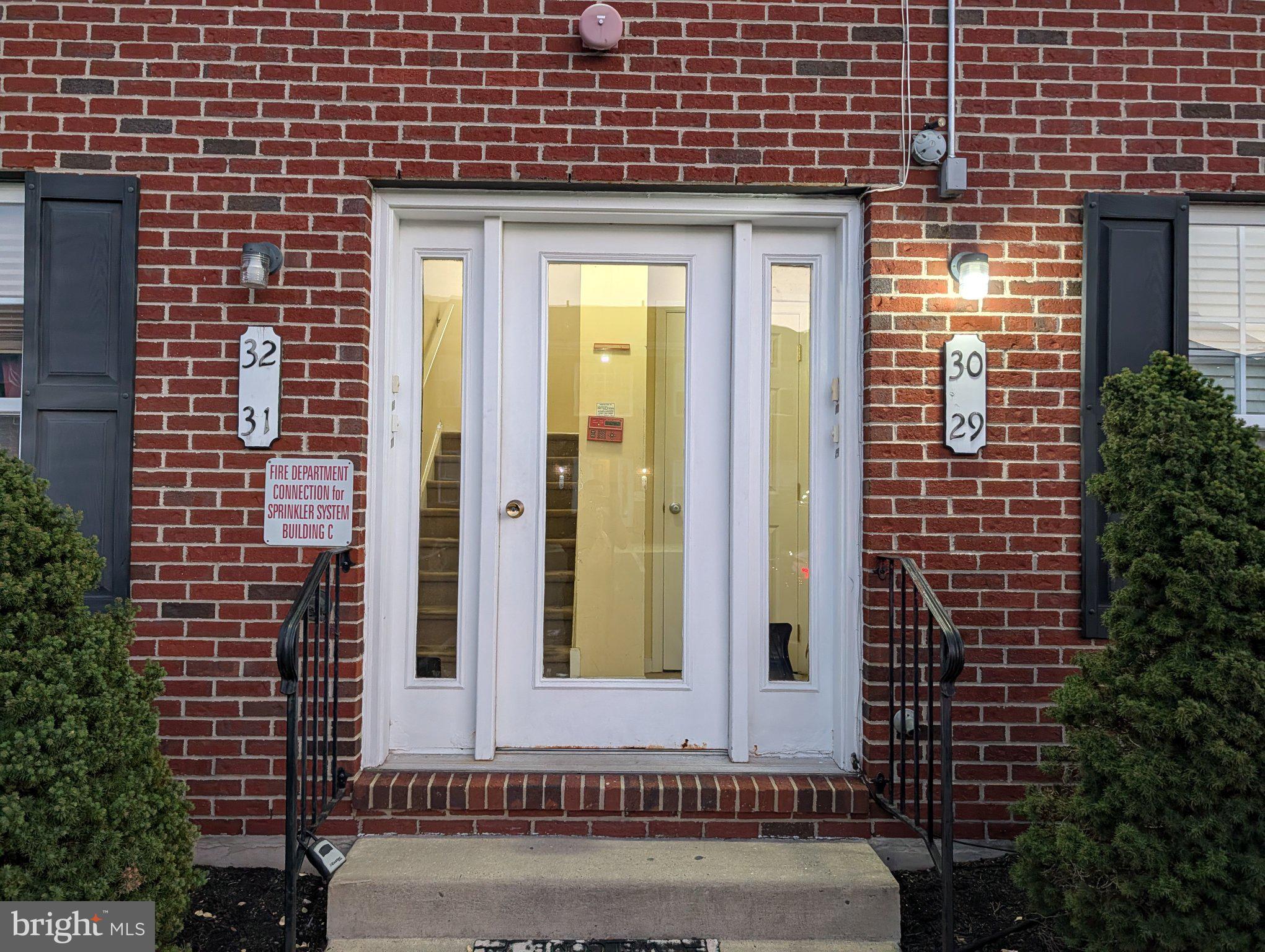 9228 Blue Grass Road, Unit 30 Philadelphia, PA 19114 - Photo 3 of 11 Inviting entrance with classic charm.
