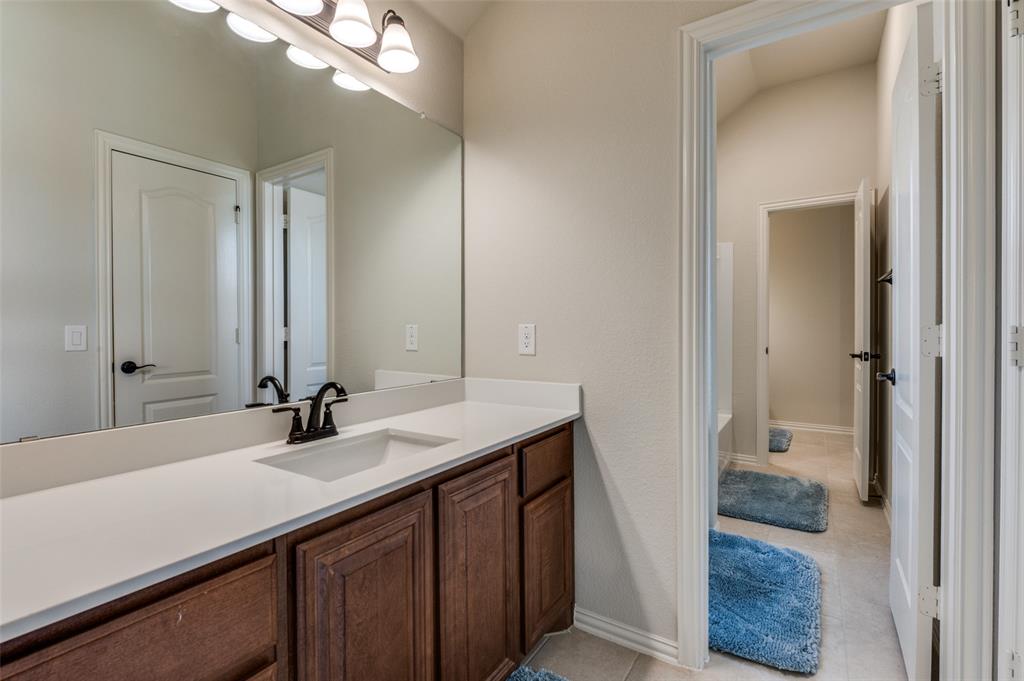 3822 Myrtle Way Kaufman, TX 75142 - Photo 28 of 39 a bathroom with a sink a vanity and a mirror