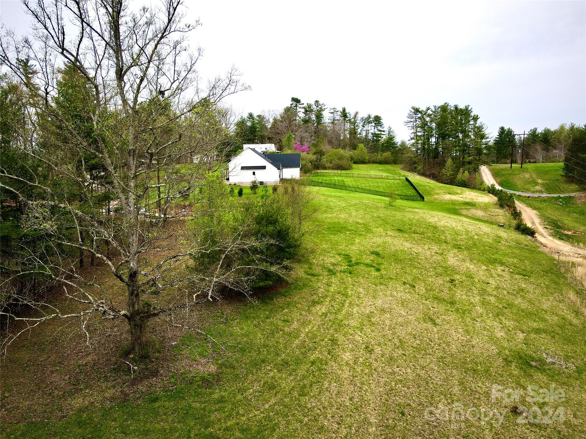 56 Tommy Ray Ridge, Unit 7 Weaverville, NC 28787 - Photo 8 of 18 a view of a town with barn trees