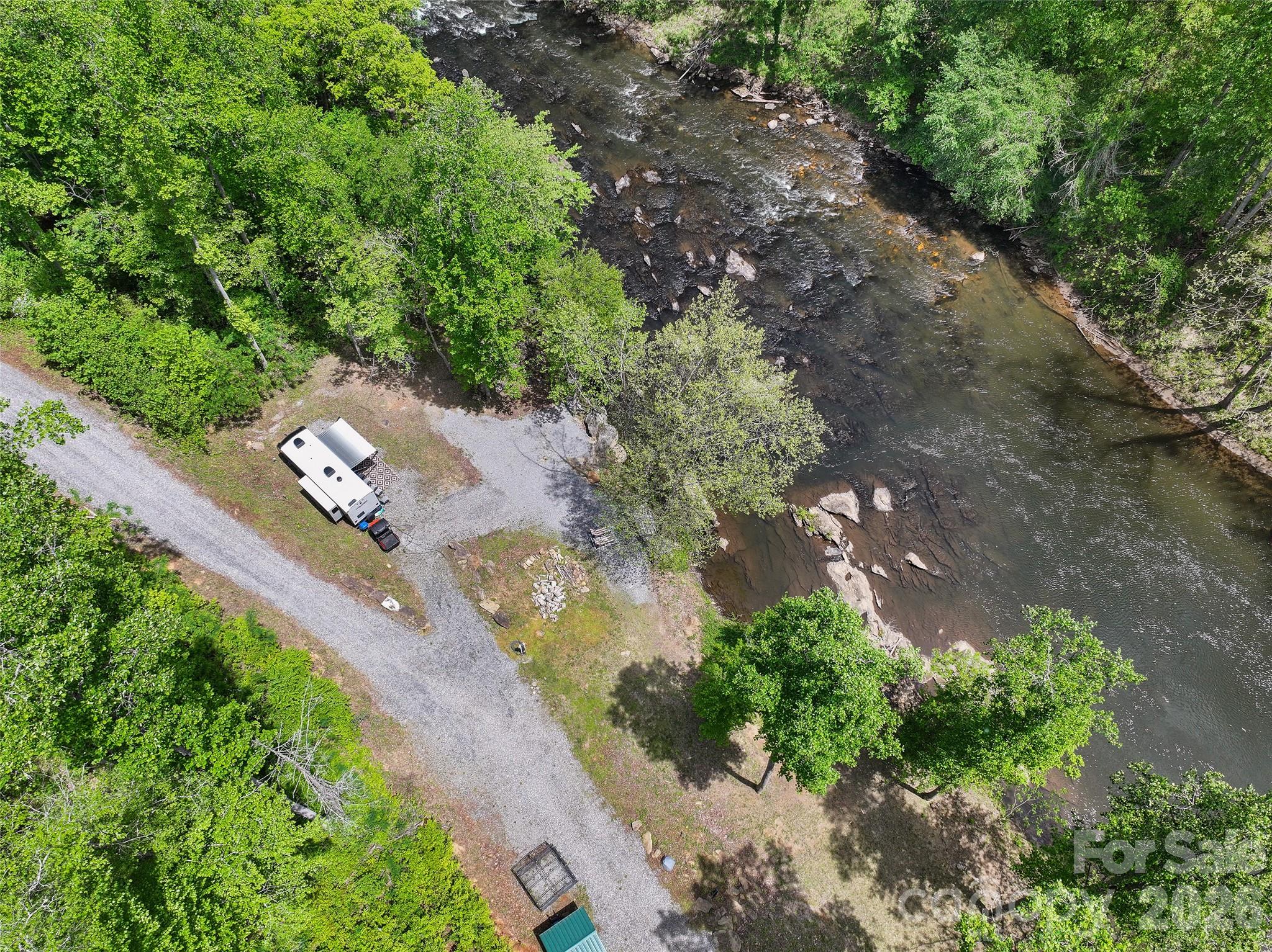 788 Cowee Tunl Road Sylva, NC 28779 - Photo 18 of 31 an aerial view of a house with a yard