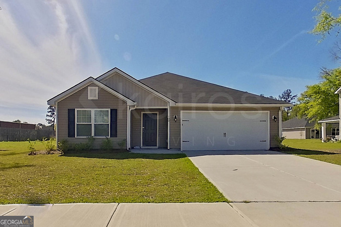 100 Ebenezer Blf Way Springfield, GA 31329 - Photo 1 of 20 a front view of a house with a yard