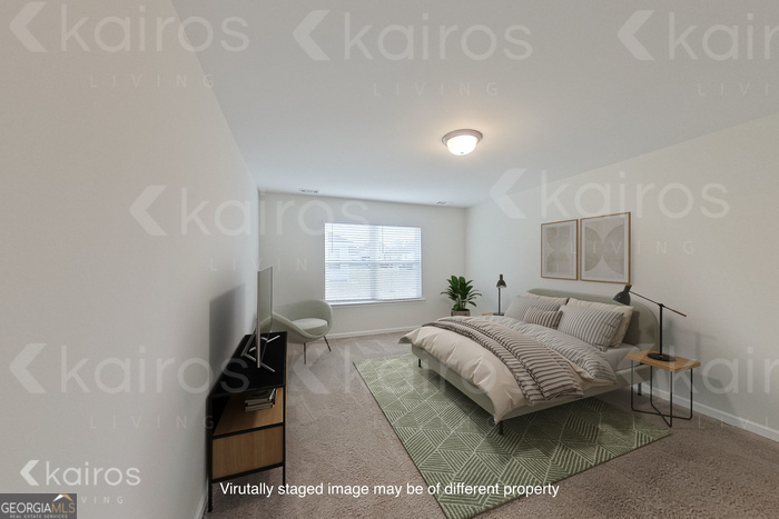 100 Ebenezer Blf Way Springfield, GA 31329 - Photo 12 of 20 a bedroom with a bed and window