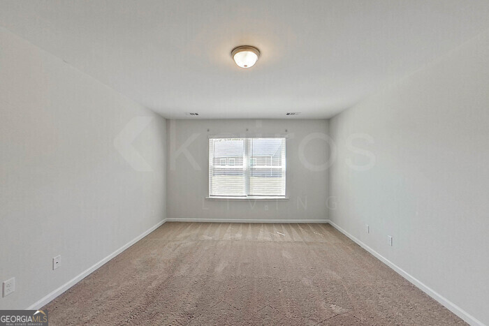 100 Ebenezer Blf Way Springfield, GA 31329 - Photo 15 of 20 an empty room with a window