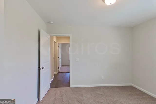 a view of a room with a hallway