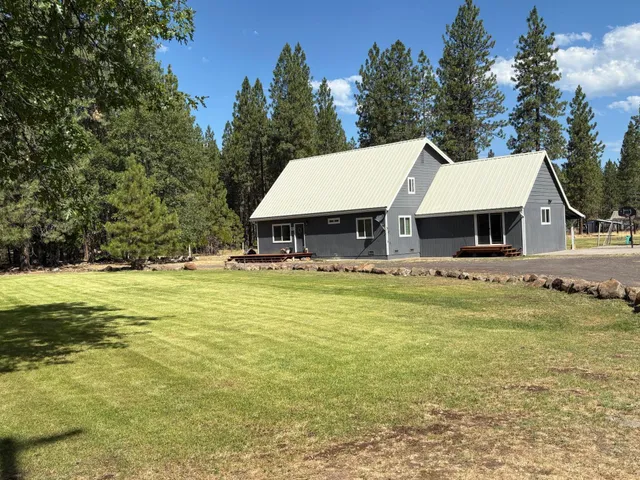 a front view of a house with swimming pool