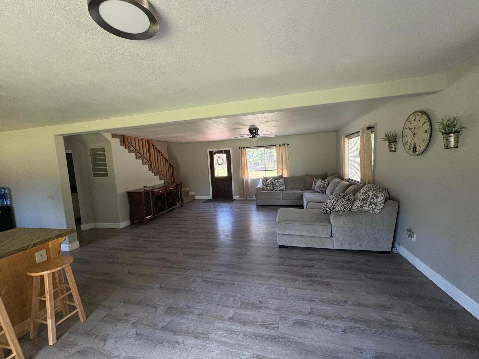 40596 Old School Road Fall River Mills, CA 96028 - Photo 13 of 29 a living room with furniture and a wooden floor