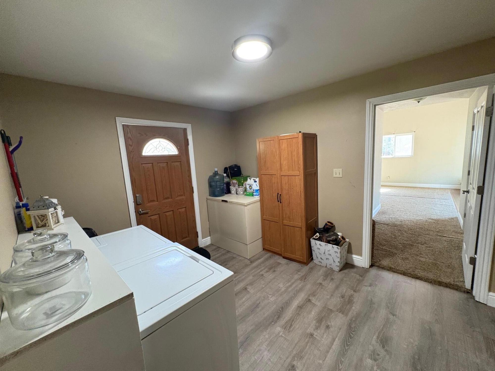 40596 Old School Road Fall River Mills, CA 96028 - Photo 19 of 29 a room with a bed and a refrigerator