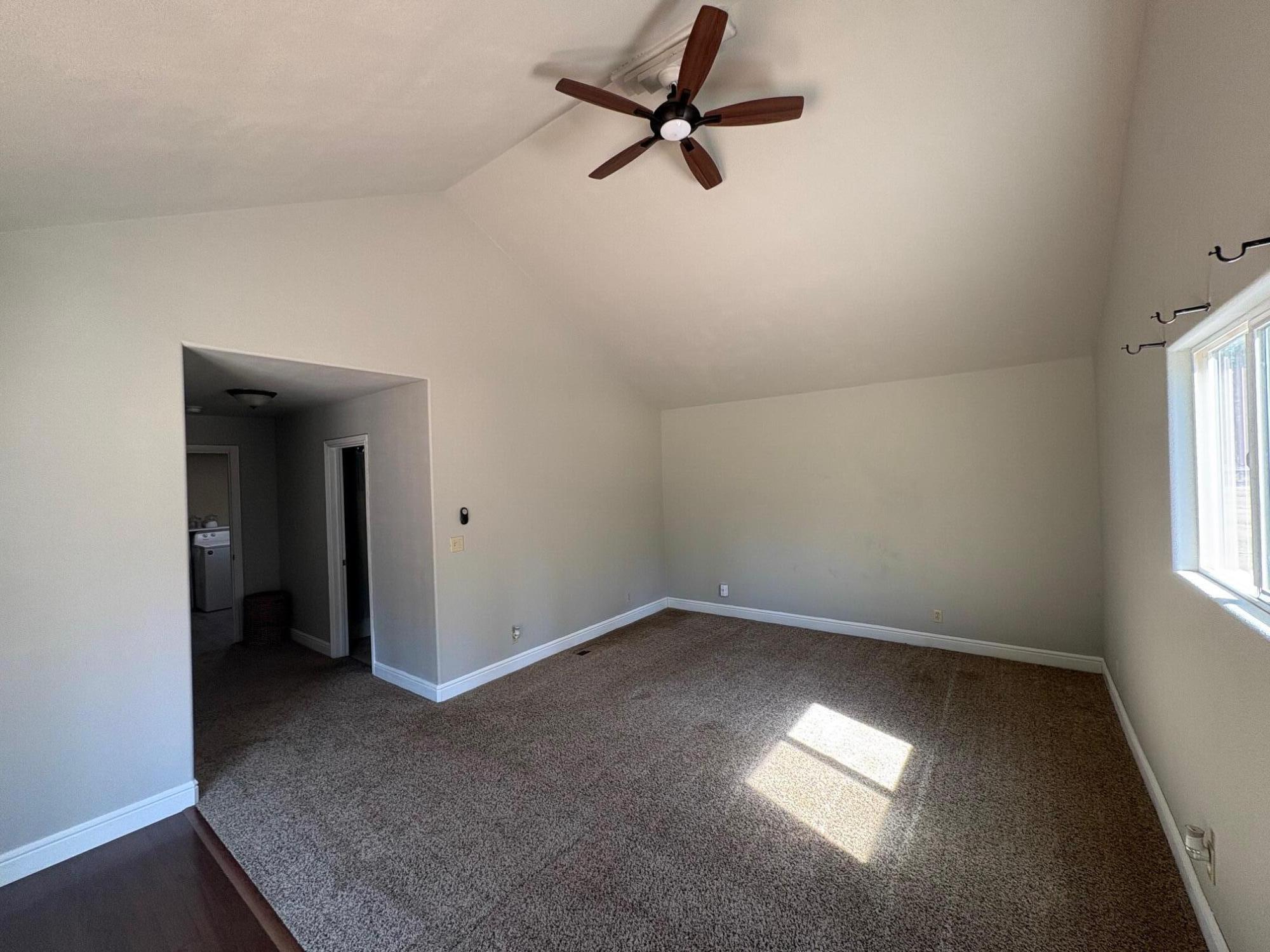 40596 Old School Road Fall River Mills, CA 96028 - Photo 21 of 29 wooden floor in an empty room with a window