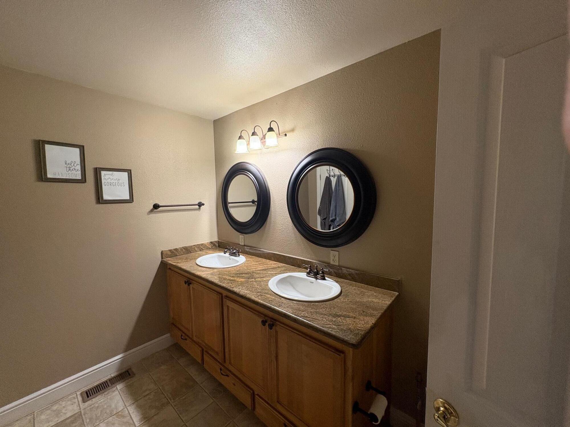 40596 Old School Road Fall River Mills, CA 96028 - Photo 23 of 29 a bathroom with a sink and a mirror