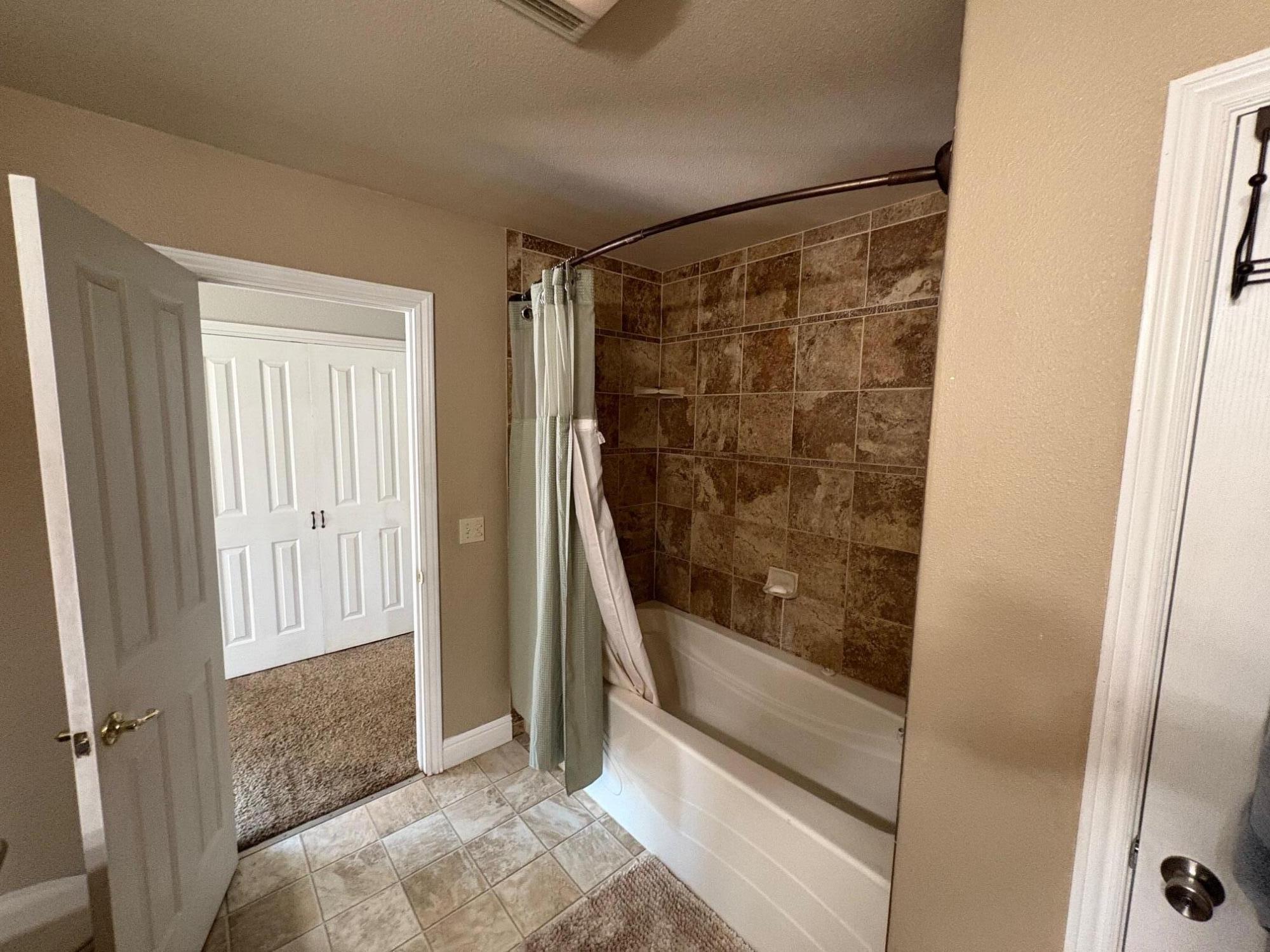 40596 Old School Road Fall River Mills, CA 96028 - Photo 28 of 29 a bathroom with a glass shower door