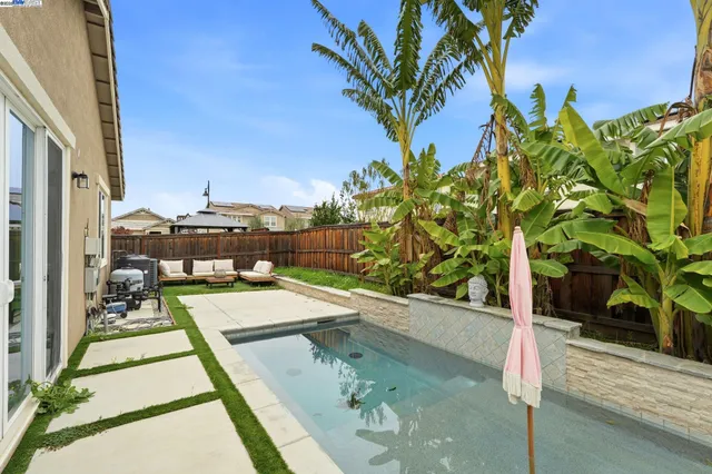 a picture of a building with a tree