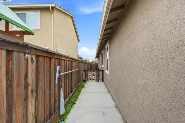 a view of a house with wooden walls