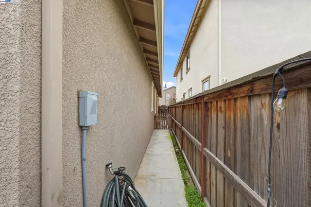 a view of balcony with wooden floor