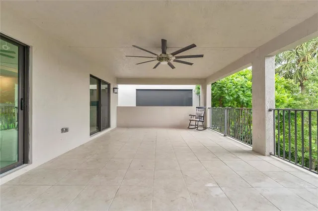 a view of a livingroom with a flat screen tv