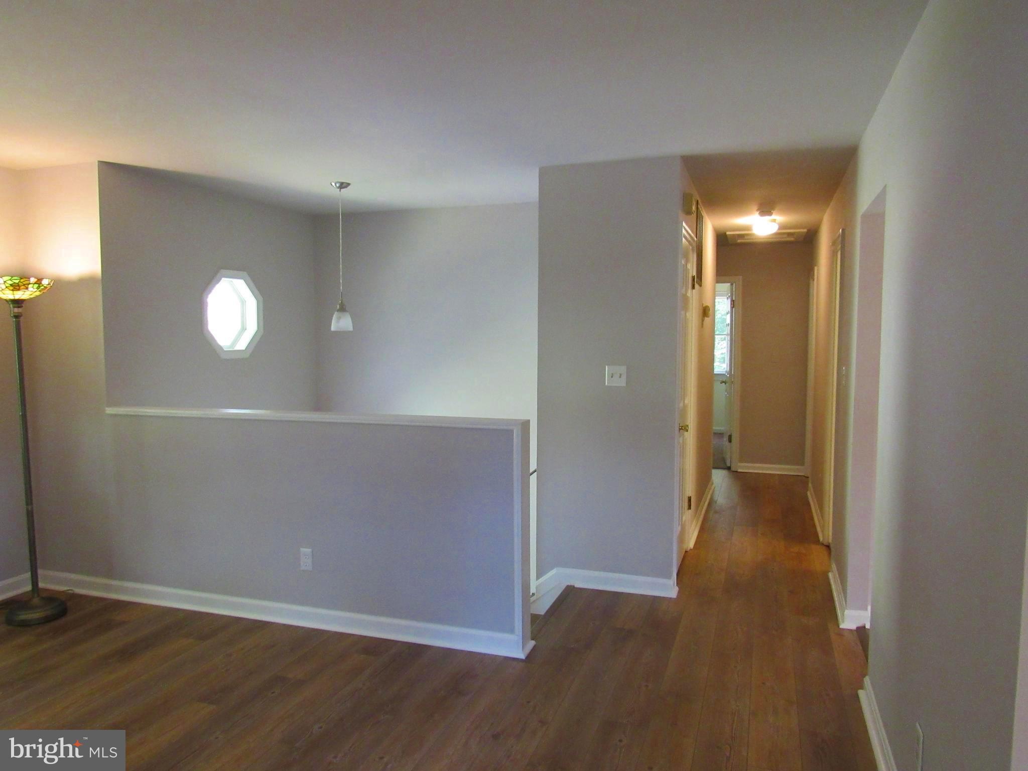 3235 Richfield Road Huntingtown, MD 20639 - Photo 22 of 64 a view of a livingroom with wooden floor