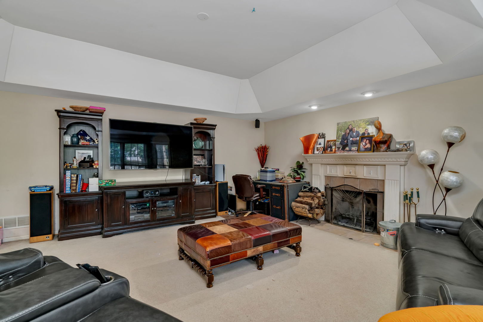 745 Feather Sound Drive Bolingbrook, IL 60440 - Photo 15 of 38 a living room with furniture and a fireplace
