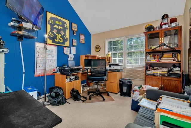 a room with furniture and a window