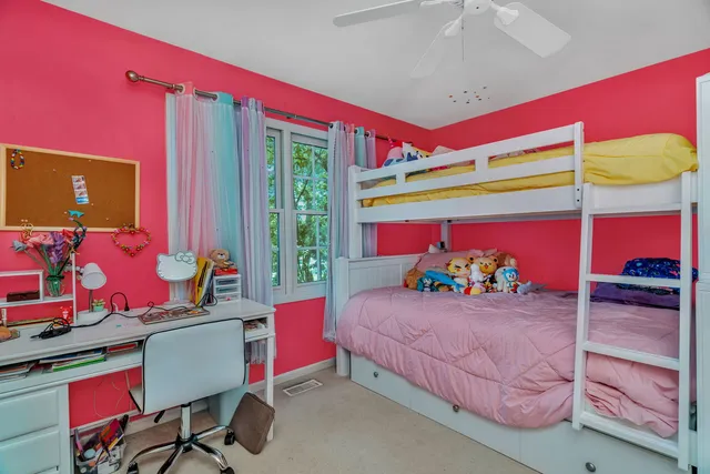 a bedroom with a bed and a bed