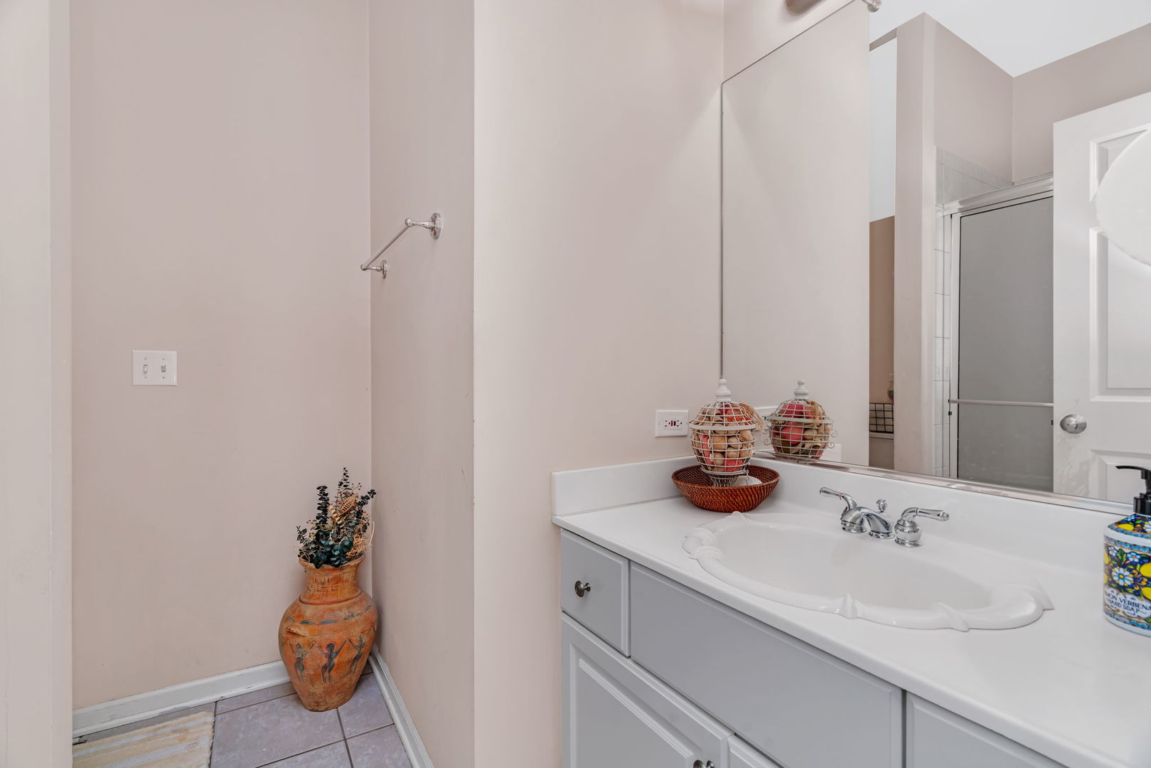 745 Feather Sound Drive Bolingbrook, IL 60440 - Photo 26 of 38 a bathroom with a sink and a mirror