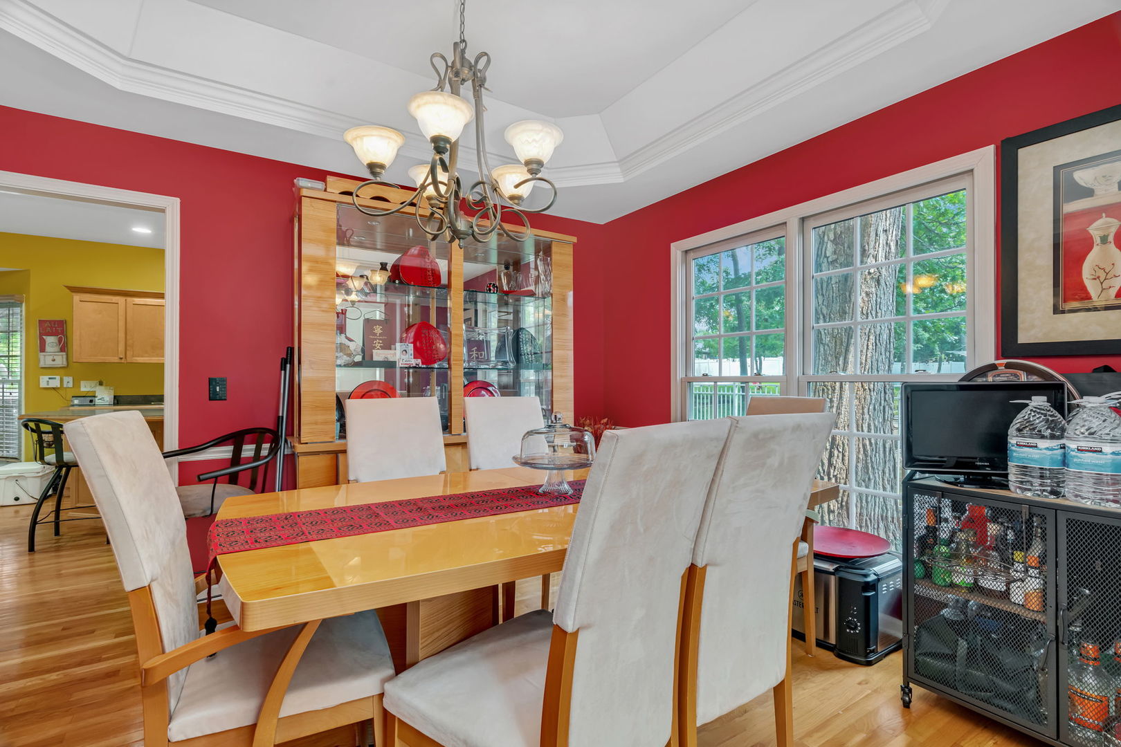 745 Feather Sound Drive Bolingbrook, IL 60440 - Photo 4 of 38 a view of a dining room with furniture a chandelier and a window
