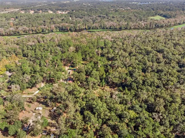 a view of a city with mountains in the background