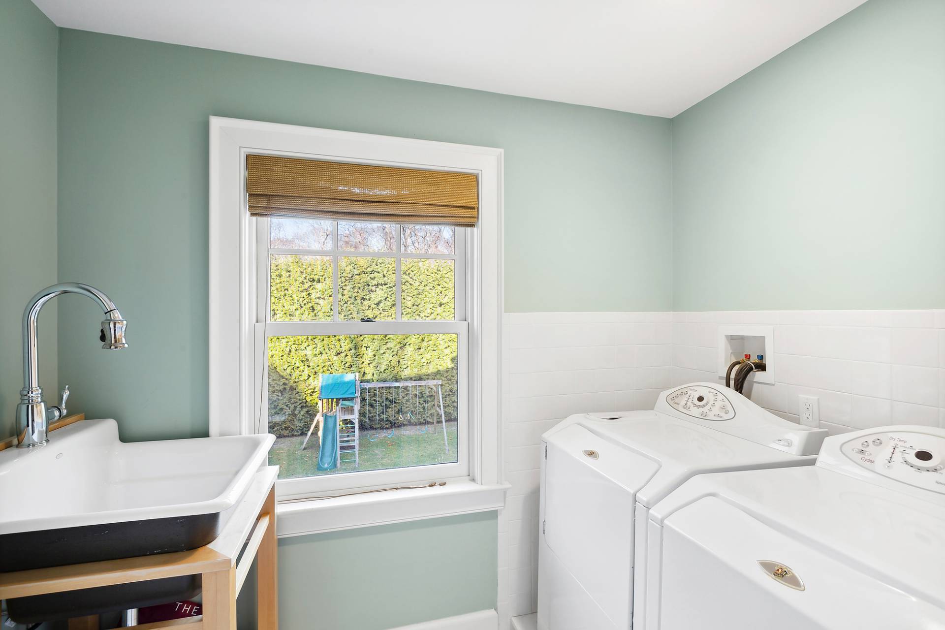 24 Peconic Bay Avenue Southampton, NY 11968 - Photo 15 of 18 a utility room with dryer and washer
