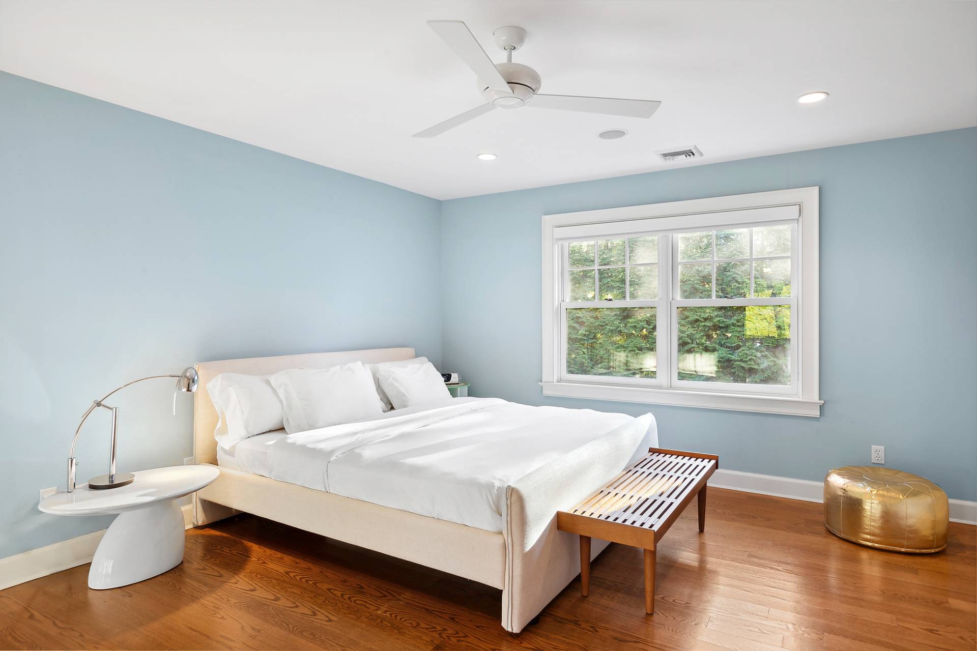 24 Peconic Bay Avenue Southampton, NY 11968 - Photo 7 of 18 a bedroom with a bed and window