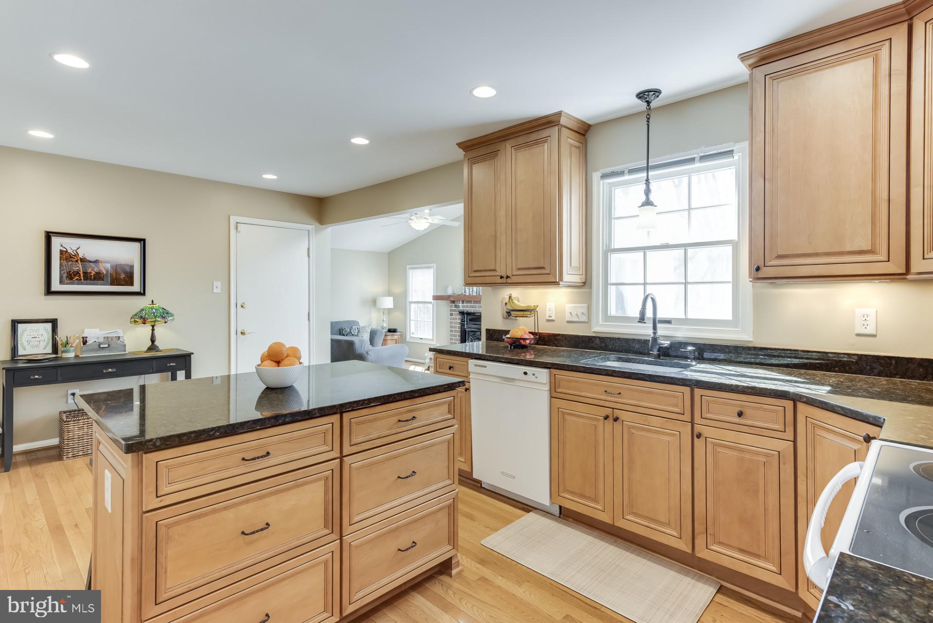 307 Riding Ridge Road Annapolis, MD 21403 - Photo 9 of 36 a kitchen with cabinets appliances a sink and a window