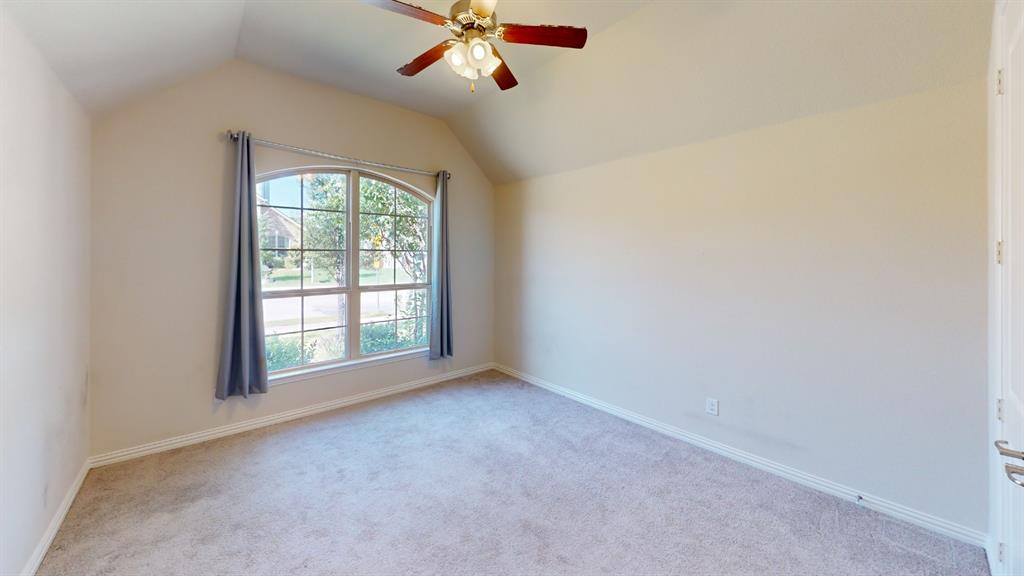 14712 Spitfire Trail Fort Worth, TX 76262 - Photo 18 of 25 Neutral carpet flooring complementing light-toned walls