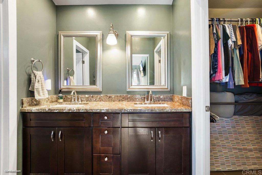 1963 Alderbrook Place Chula Vista, CA 91913 - Photo 15 of 30 a bathroom with a sink and a mirror