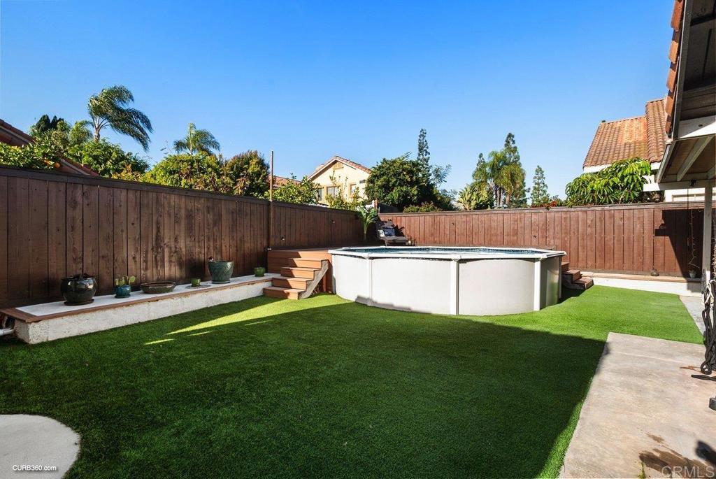 1963 Alderbrook Place Chula Vista, CA 91913 - Photo 24 of 30 a view of a house with backyard and sitting area